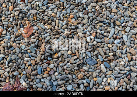 D'un coup horizontal river rocks arrière-plan. Banque D'Images