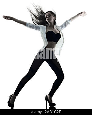 Une belle jeune femme caucasienne cheveux long ballet moderne disco dancer dancing silhouette studio shot ombre isolé sur fond blanc Banque D'Images