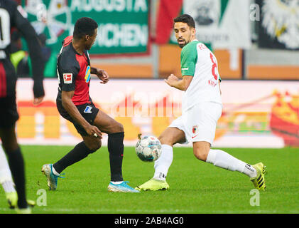 Augsburg, Allemagne. 24 Nov, 2019. Football Augsburg-Berlin, Augsbourg, le 24 novembre 2019. Rani KHEDIRA, CAF 8 concurrence pour la balle, s'attaquer, duel, l'en-tête, zweikampf, action, lutte contre l'Javairo DILROSUN, le Hertha Berlin 16 FC AUGSBURG - Hertha BSC Berlin - DFL RÈGLEMENT INTERDIT TOUTE UTILISATION DES PHOTOGRAPHIES comme des séquences d'images et/ou quasi-vidéo - 1.German Soccer League, Augsbourg, le 24 novembre 2019. Saison 2019/2020, journée 12, Crédit : Peter Schatz/Alamy Live News Banque D'Images