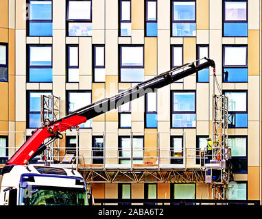 Grue mobile et workman remplacement vacances 600x600 Banque D'Images