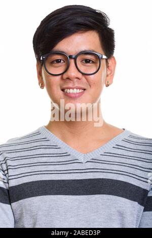 Visage de happy Asian man smiling et portant des lunettes Banque D'Images