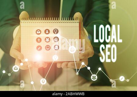 Signe texte montrant Seo Local. Texte photo d'optimiser votre site web pour mieux référencé pour un public local Banque D'Images