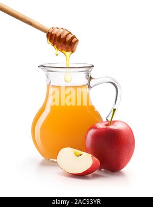 Le vinaigre de cidre de pomme avec du miel isolé sur fond blanc Banque D'Images