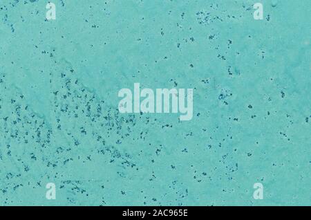 Feuille de métal avec taches de rouille, peint en vert. Résumé la texture. Close up. Banque D'Images