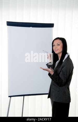 Coach en face d'un tableau vide au cours de la formation Banque D'Images