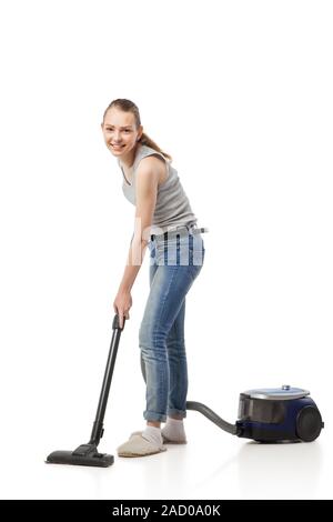 Femme souriante avec aspirateur isolated Banque D'Images