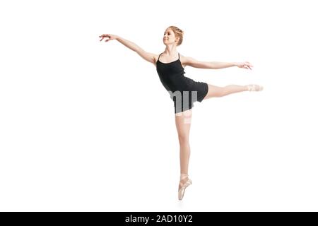 Jeune danseuse de ballet dans les airs Banque D'Images