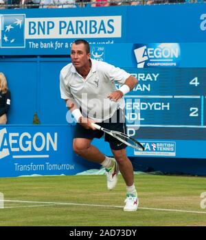 Ivan Lendl apparaissant dans un tournoi de tennis de charité au Queen's club de tennis à Londres avec Andrew Murray, Michael MCINTYRE, Jimmy Carr, Jonathan Ross et Sir Richard Branson au nom de la Ross Hutchins et Royal Marsden Cancer en 2013. Banque D'Images