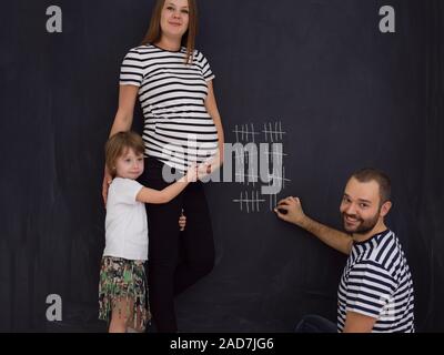 Comptes de famille heureuse semaine de grossesse Banque D'Images