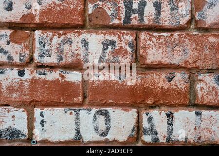 Mur de briques rustiques peintes Banque D'Images