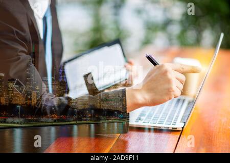Double exposition Businessman hand Banque D'Images