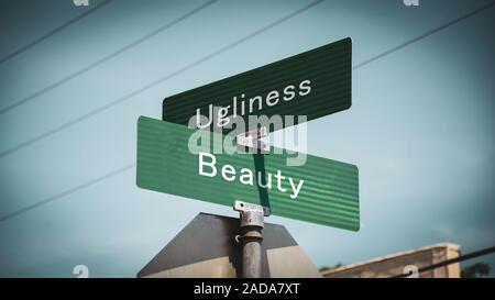 Beauté et laideur Street Sign Banque D'Images