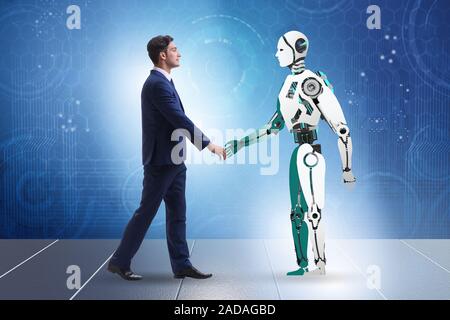Concept de la coopération entre les humains et les robots Banque D'Images