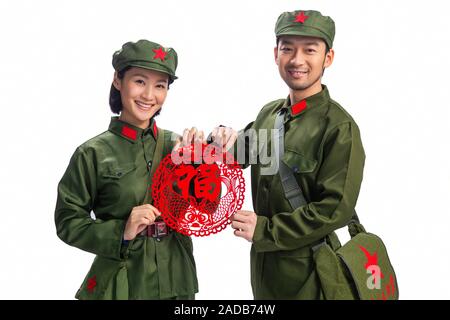 Photo Jeune couple en uniforme Banque D'Images