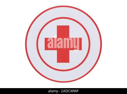 Croix rouge circulaire isolé sur fond blanc Banque D'Images