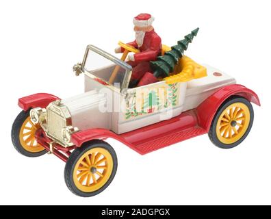 Père Noël dans une vieille Ford Motor Car. Dinky Toy en métal moulé avec le Père Noël et un arbre de Noël. Banque D'Images