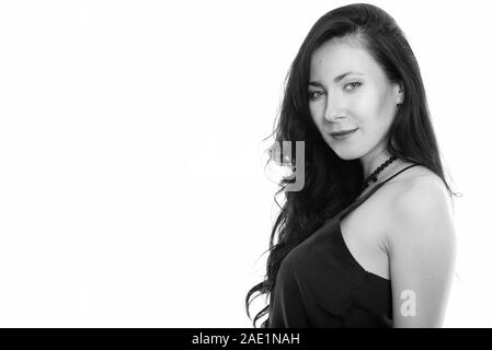 Studio shot of young Beautiful woman en noir et blanc Banque D'Images