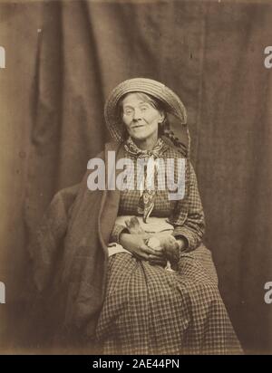 Photographie du Dr Hugh Welch Diamond vers 1855 représentant une femme au Surrey County Asylum tenant un oiseau mort. L'image illustre la photographie médicale du milieu du XIXe siècle et la documentation de patients. Banque D'Images