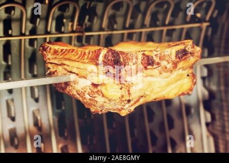 Côtes levées de porc coupe sur grill électrique, tonique libre Banque D'Images