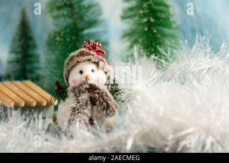 Bonhomme de jouets de Noël avec l'arrière-plan de vacances Banque D'Images