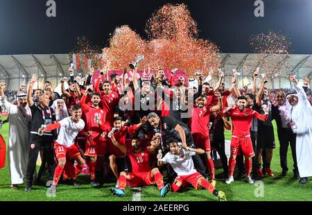 Doha, Qatar. 8e déc, 2019. Les joueurs de Bahreïn célébrer après avoir remporté la 24e Coupe du Golfe Persique 2019 match final entre Bahreïn et l'Arabie saoudite à Doha, Qatar, le 8 décembre 2019. Credit : Nikku/Xinhua/Alamy Live News Banque D'Images