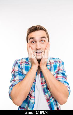 Un portrait d'un bel homme jeune surpris Banque D'Images