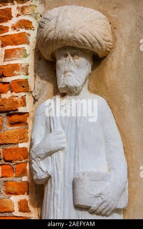 Marchand avec turban maure médiéval antique statue situé dans le Campo dei Mori (Maures) carrés dans le centre historique de Venise (13e siècle, auteur u Banque D'Images