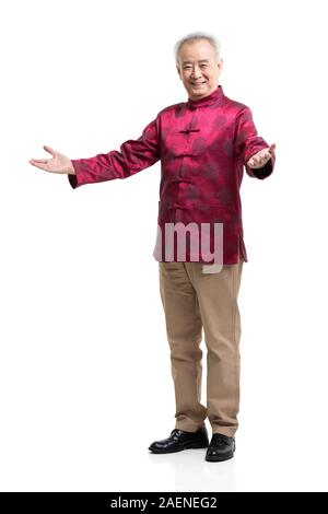 Happy senior man in costume tang Banque D'Images