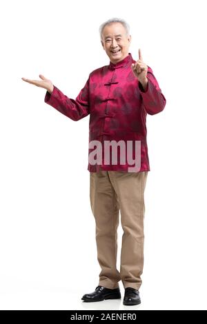 Happy senior man in costume tang Banque D'Images