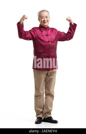 Happy senior man in costume tang Banque D'Images