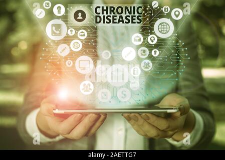 Texte de l'écriture des maladies chroniques. Photo conceptuelle une maladie ou condition qui dure plus de temps Banque D'Images