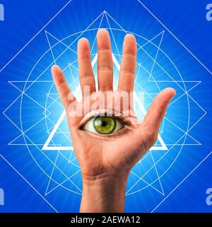 Oeil dans la paume de la main. Symbole spirituel concept. Banque D'Images