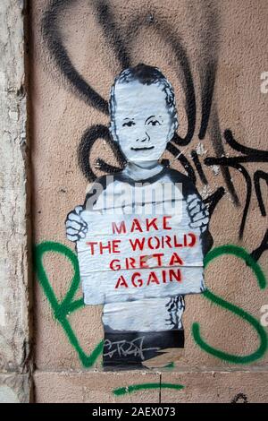 Rendre le monde nouveau Greta , signe sur mur dans Lisbonne, Portugal Banque D'Images