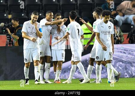 Doha, Qatar. Dec 11, 2019. Pedro Miguel (2L) d'Al-Sadd Sports Club célèbre avec ses coéquipiers après avoir marqué le but lors de la Coupe du Monde des Clubs de la FIFA 2019 premier tour du Qatar entre le Qatar's Al-Sadd SC et la Nouvelle Calédonie Hienghene Sport au Jassim bin Hamad Stadium de Doha, capitale du Qatar, le 11 décembre 2019. Credit : Nikku/Xinhua/Alamy Live News Banque D'Images