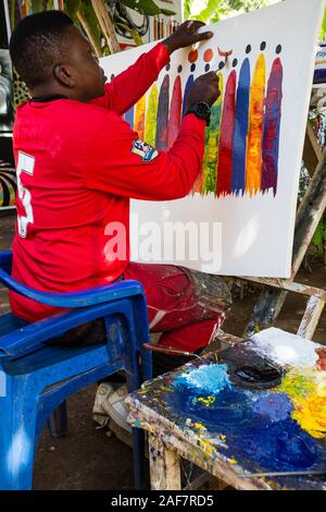 La Tanzanie. Le MTO wa Mbu. Dans la peinture de l'artiste "Kisu" (couteau) Style. Banque D'Images