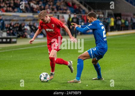 Berlin, Allemagne. 13 Décembre, 2019. Fredrik Jensen (FC Augsburg) et Kevin Akpoguma (TSG 1899 Hoffenheim) au football, Bundesliga, Journée 15 : TSG 1899 Hoffenheim vs FC Augsburg le PreZero Arena le 13 décembre 2019 à Berlin, Allemagne. Photo : Horst/Ettensberger-ESPA ESPA Crédit : Images/Alamy Live News Banque D'Images