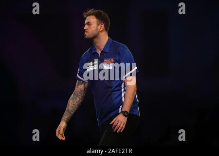 Ross Smith réagir au cours de la troisième journée du Championnat du Monde de William Hill à l'Alexandra Palace, Londres. Banque D'Images