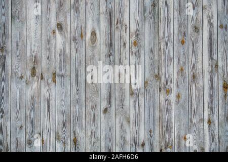 Doublure en bois mur gris conseils. Clôture en bois vertical, la texture. La tonalité de l'image. Banque D'Images