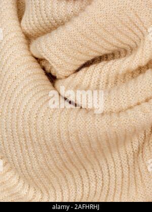 Tricots en laine beige naturel texture agréable. Banque D'Images