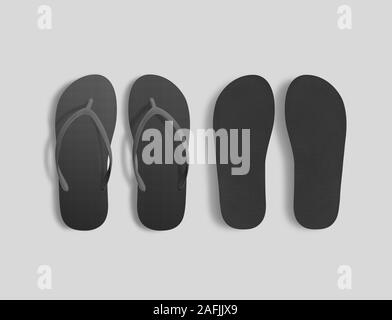 Paire de chaussons de plage noirs vierges mockup, dessus, vue de la semelle Banque D'Images