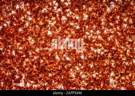 Macro exteme d'une surface Goldstone. Banque D'Images