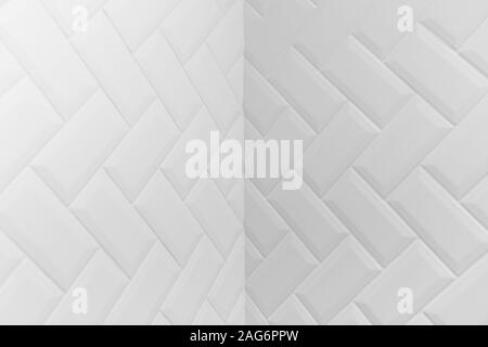 Angle intérieur de carreaux en céramique blanc mat biseauté herringbone motif sur le mur. Banque D'Images