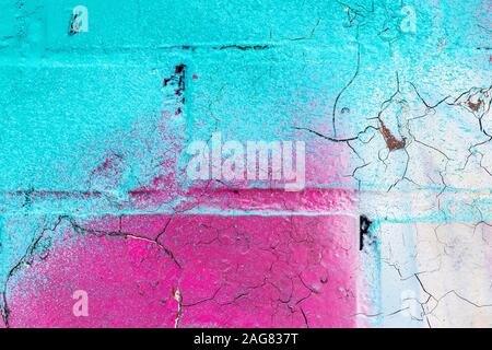 Fragment de graffitis colorés peints sur un mur de briques. La texture. Résumé fond pour la conception. Banque D'Images