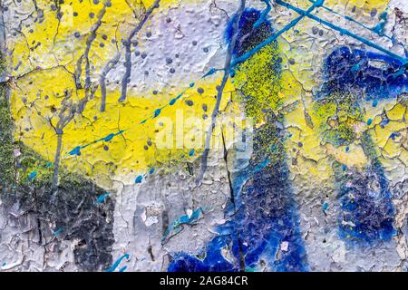 Fragment de graffitis colorés peints sur un mur de béton. La texture. Résumé fond pour la conception. Banque D'Images
