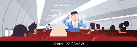 Steward expliquant aux passagers comment utiliser les masques à oxygène en situation d'urgence de bord mâle la démonstration de la sûreté de l'avion moderne de l'intérieur du concept d'illustration vectorielle horizontale Illustration de Vecteur