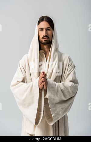 Homme religieux avec les mains et de prier J sus robe avec