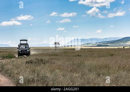 Un camion dans les plaines de Masai Mara Banque D'Images
