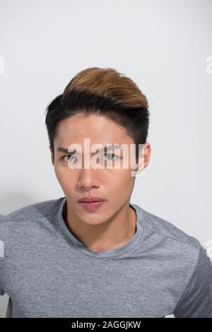 Close up portrait of asian man wearing tshirt. Banque D'Images