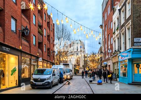 Les lumières de Noël à Earlham Street, Covent Garden, Londres, UK Banque D'Images