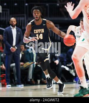 Coral Gables, en Floride, aux Etats-Unis. Dec 21, 2019. Coppin State Eagles guard Andrew Robinson (14) déplace la balle pendant le NCAA men's basketball match contre les ouragans à Miami le centre Watsco à Coral Gables, en Floride. Miami a gagné 91-60. Mario Houben/CSM/Alamy Live News Banque D'Images